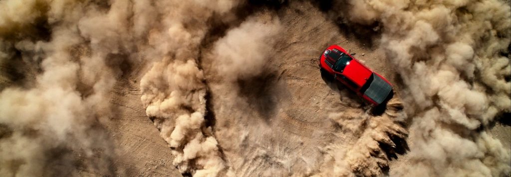 2023 Ram TRX driving circles in dirt field