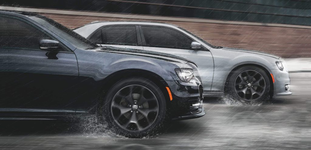 Black and Silver 2023 Chrysler 300 with excellent handling in adverse conditions like wet roads