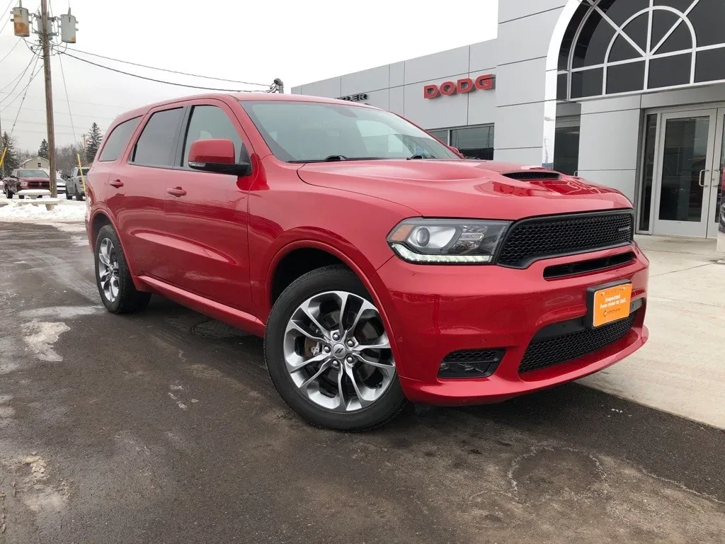Dodge Durango Parked 3/4 Front View in Front of the Benna Chrysler Dodge Jeep Ram Storefront