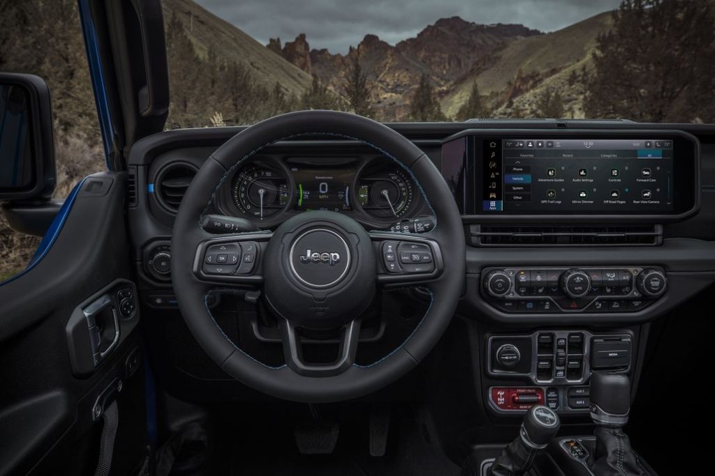 New 2024 Jeep® Wrangler Rubicon X 4xe with 12-way power adjustable front seats and all-new instrument panel featuring Uconnect 5 system with best-in-class 12.3-inch touchscreen radio