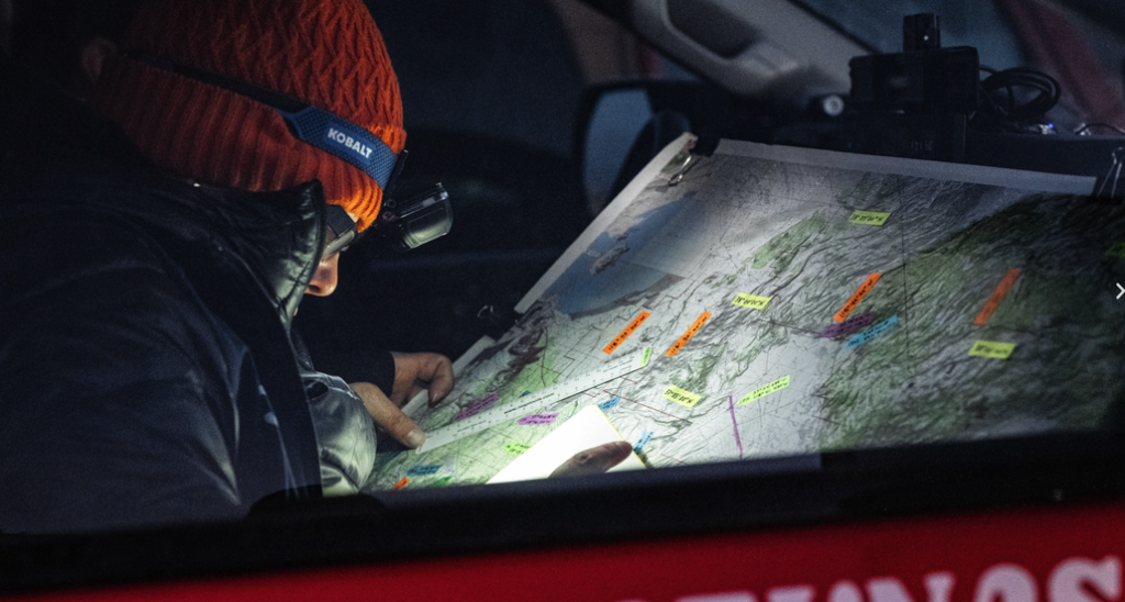 Rebelle Rally Navigator Looking at a Map
