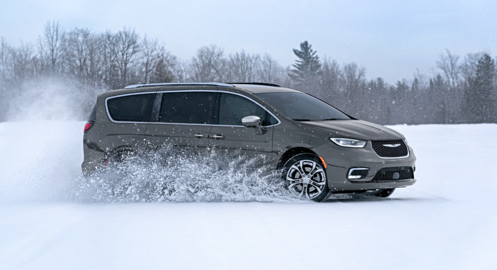 Chrysler Pacifica Driving in Snow Side 3/4 View