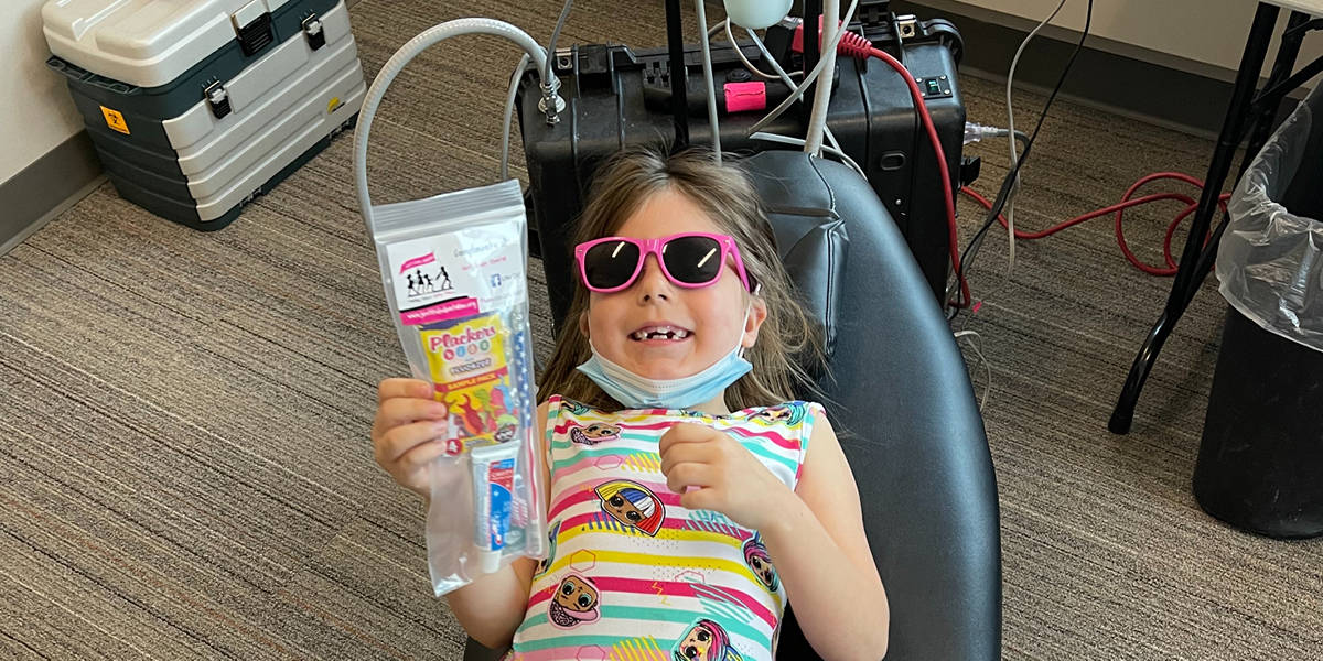A Happy Child receiving services from Just Kids Dental