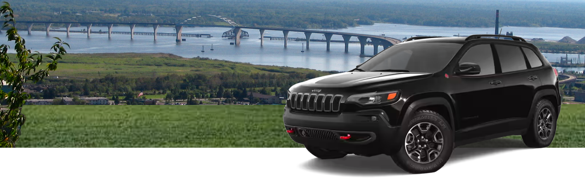 2023 Black Jeep Cherokee parked near the Bong Bridge in Duluth