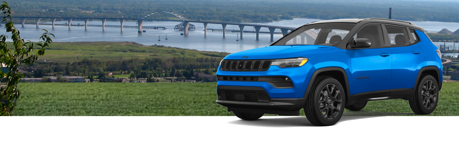 2023 Blue Jeep Compass parked near the Bong Bridge in Duluth