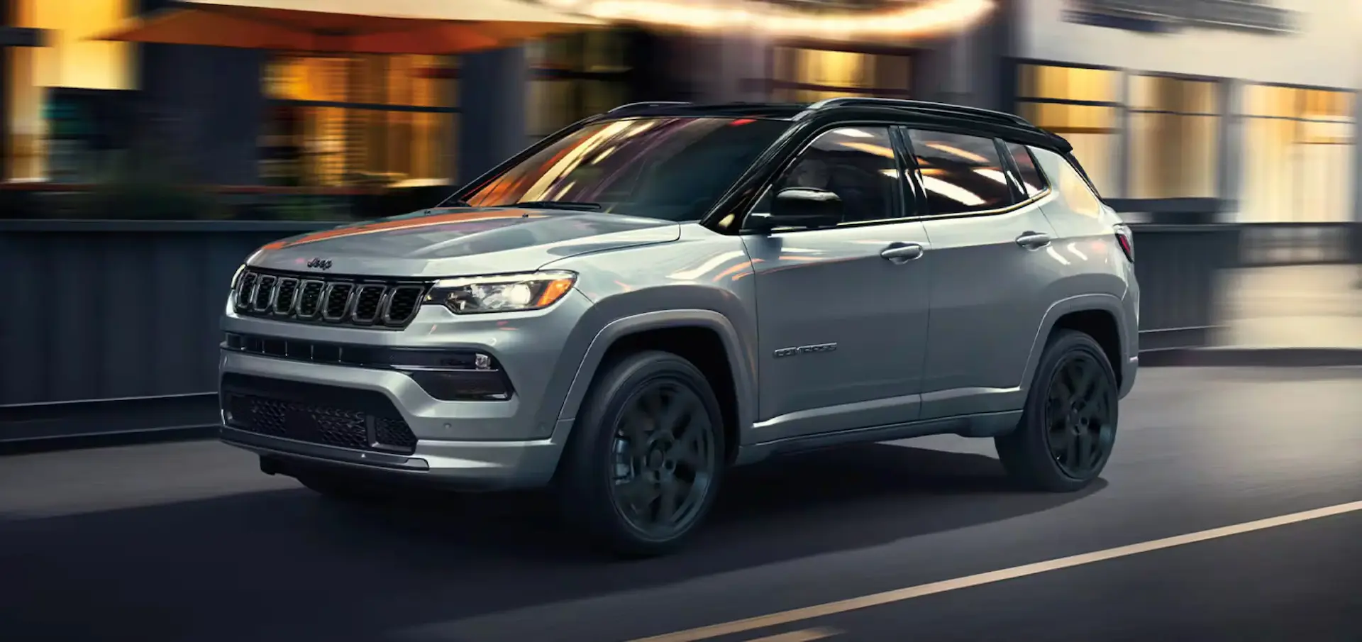 2025 Jeep Compass Front Side View on the Road in Motion
