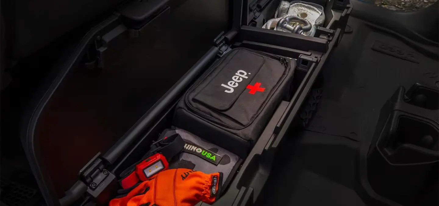 Under Floor Storage with First Aid Kit in the 2025 Jeep Gladiator