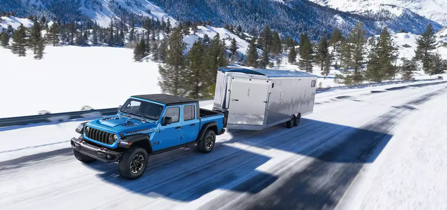 2025 Jeep Gladiator Towing Capabilities and Performance Driving on a Snow Covered Road