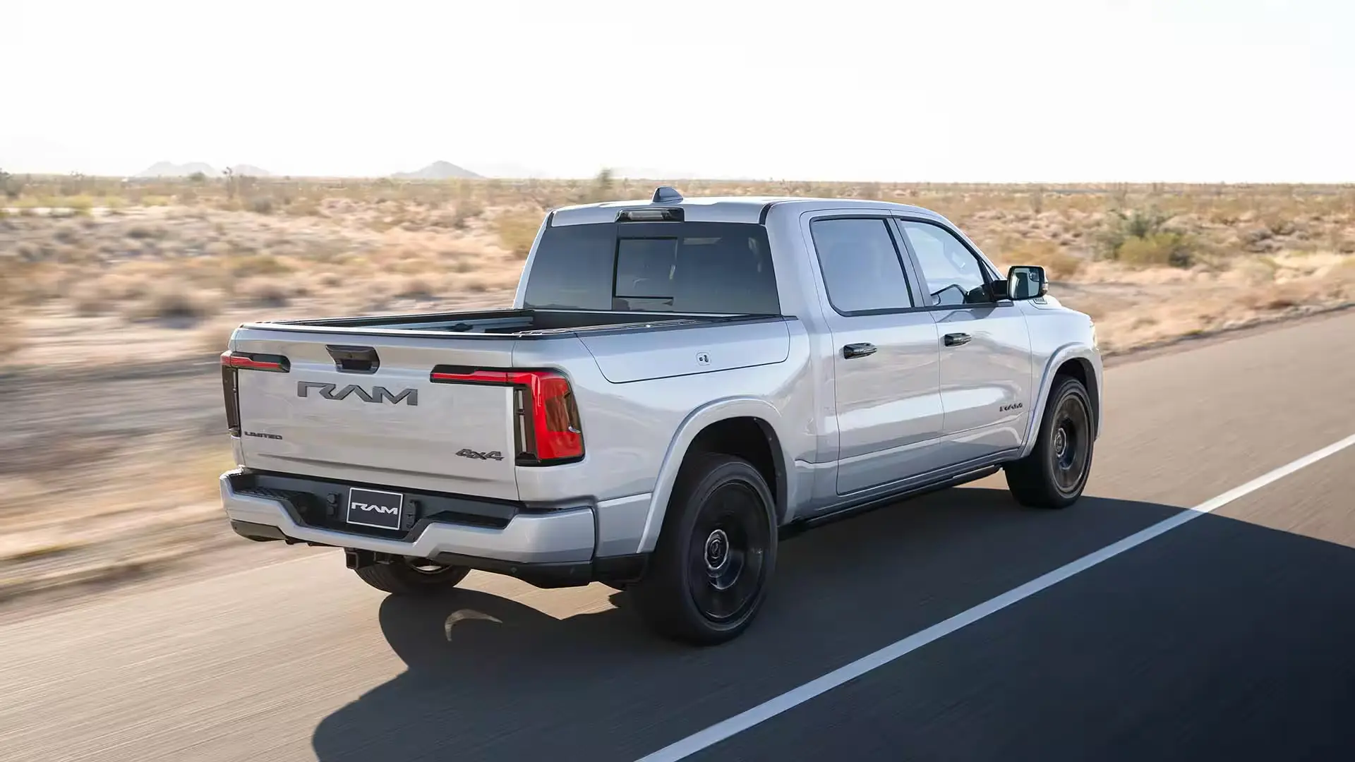 Rear View of the Ram 1500 Ramcharger in Motion on the Road