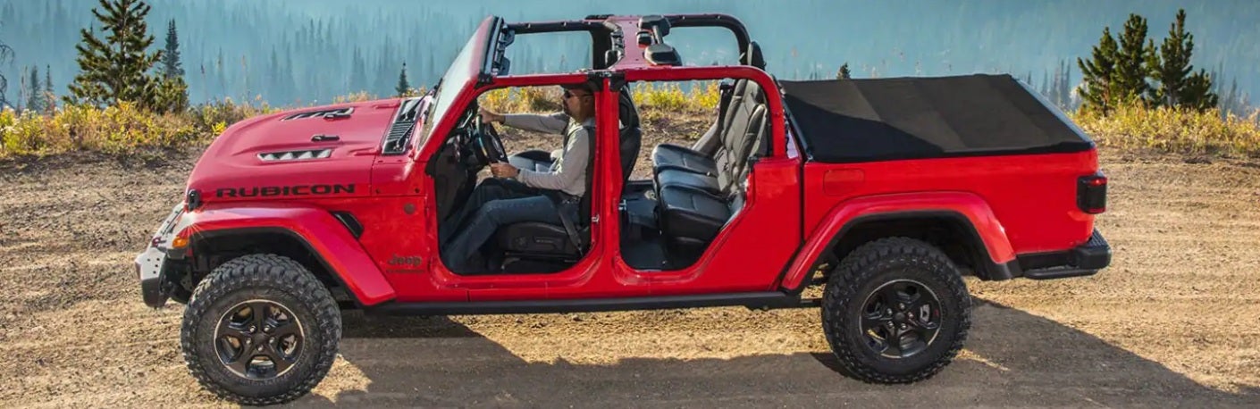 Red 2023 Jeep Gladiator Rubicon on Mountain Road